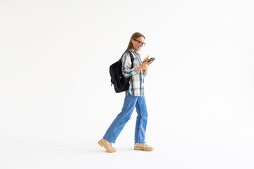Young beautiful woman using smart phone on white background