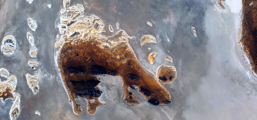 	
abstract landscape of the deserts of Africa from the air emulating the shapes and colors of the...