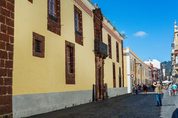 Fototapeta na wymiar Street with historic buildings in La Laguna city in Tenerife. Canary Islands.