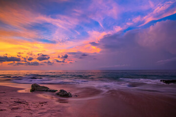 Fototapeta na wymiar Tegal Wangi Beach, in Bali of Indonesia with a view sunset, clift and rocky. so, beautifull ...