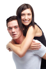 So happy together. A beautiful young woman being carried by her boyfriend while isolated on white.