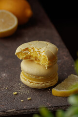 Lemon macaroons on a dark background