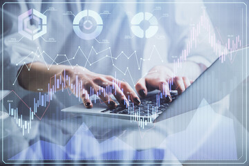 Double exposure of woman hands typing on computer and forex chart hologram drawing. Stock market invest concept.