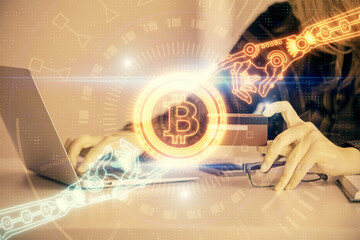 Multi exposure of woman on-line shopping holding a credit card and crypto theme drawing. Blockchain E-commerce concept.