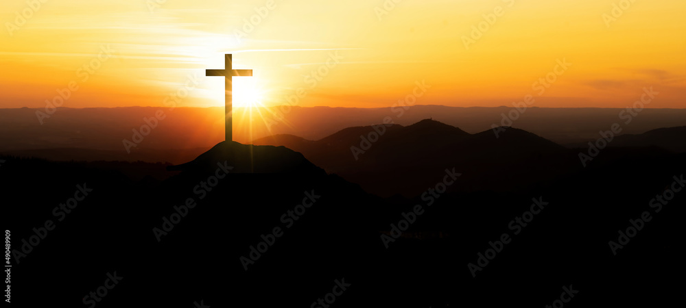 Wall mural Religious grief landscape background banner panorama - Breathtaking view with black silhouette of mountains, hills, forest and cross / summit cross, in the evening during the sunset or sunrise