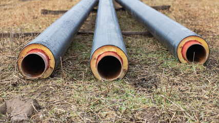 Metal pipes with thermal insulation of the district heating system for minimal heat loss....