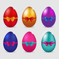 Easter egg decorated with ribbon with bow.