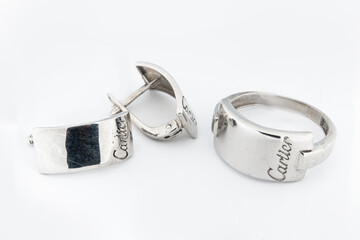 Silver jewels collection with crystals in minimalism style. Silver set of earrings and silver necklace