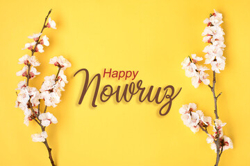 Sprigs of the apricot tree with flowers on yellow background Text Happy Nowruz Holiday Concept of spring came Top view Flat lay Hello march, april, may, persian new year - 490494704