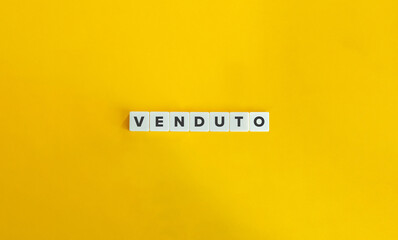 Venduto Word on Letter Tiles on Yellow Background. Minimal Aesthetics.