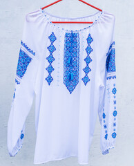 Ukrainian embroidered elements, concept of ethnic clothes, fashion details