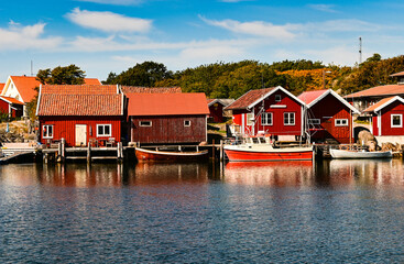 Fototapeta na wymiar Red traditional Scandinavian houses on the main town of Koster islands in Sweden