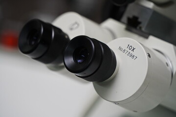 Almaty, Kazakhstan - 04.08.2021 : The virologist performs the analysis on special equipment in the laboratory.