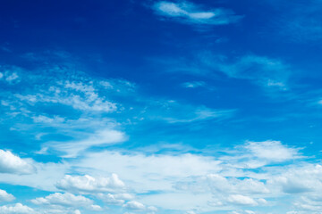 Naklejka na ściany i meble Blue sky with fluffy cloudscape nature background