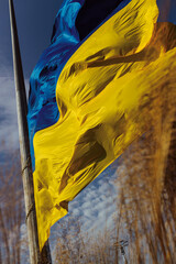 Flag waving. The symbol of Ukraine. Flag of Ukraine. Colours of national flag of Ukraine. Flag of european country Ukraine	
