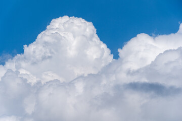Naklejka na ściany i meble Cumulonimbus cloud and blue sky in Fukuoka city, JAPAN.