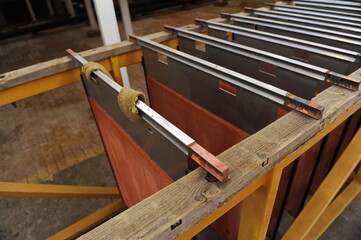 East Kazakhstan region, Kazakhstan - 12.02.2015 : Layers of cathode copper on a special lift for...