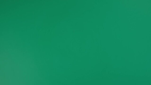 The dollar spin rotate quickly fast fly, dispart, splash to the sides with centrifugal coriolis force. The video is in reverse. Dollar twist, create pattern, make design shape circle picture.