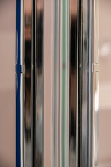 Silver longitudinal handle for a glass shower enclosure 