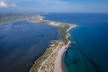 Drone photo of Land strip over Ionian Sea and Korission Lake on the Ionian Sea shore, Corfu Island, Greece