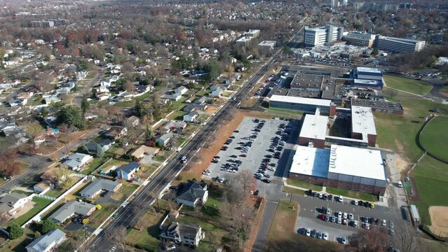 Aerial View of Traffic, Streets and Buildings of Cherry Hill, New Jersey USA on Sunny Autumn Day - Drone Shot