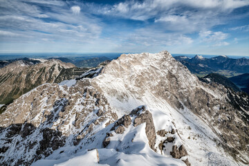 Autumn snow in the Allgau Alps. Alpine landscape with rocky mountains at a sunny day. Tirol, Austria, Europe