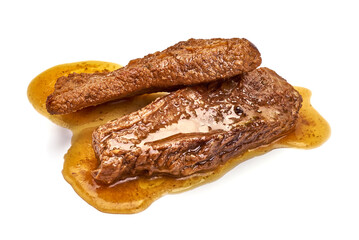 Delicious spare ribs with sauce, isolated on white background.