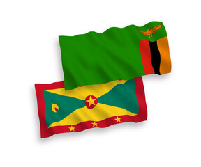 National vector fabric wave flags of Republic of Zambia and Grenada isolated on white background. 1 to 2 proportion.