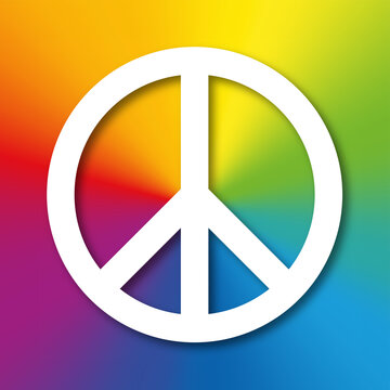 White peace symbol with shadow, on a rainbow colored background. Originally designed for the nuclear disarmament movement, now known as the peace sign, adopted by the anti-war movement. Illustration.