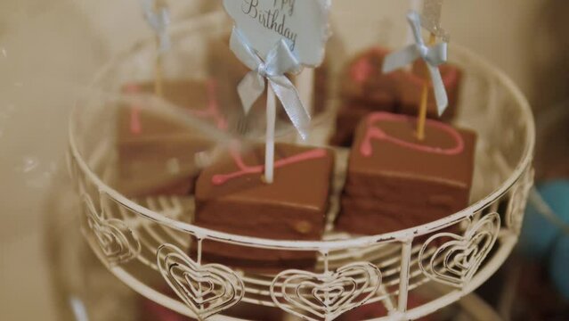 Chocolate marshmallows with happy birthday sign.
