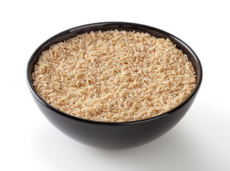 Brown rice in black bowl isolated on white background with clipping path