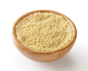 Uncooked dried cous cous in wooden bowl isolated on white background with clipping path