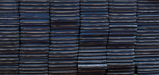 Piles of rubber liners for softening on metal. Rubber background.