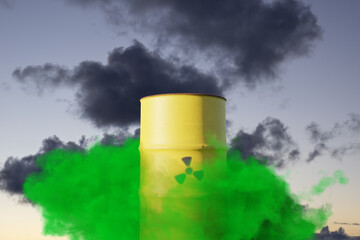 A yellow barrel of radioactive waste surrounded by a green poisonous cloud against the backdrop of...
