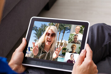 Closeup of a woman talking through video chat on tablet. communicating tablet in video chat through...