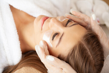Fototapeta premium Woman getting spa massage treatment at beauty spa salon