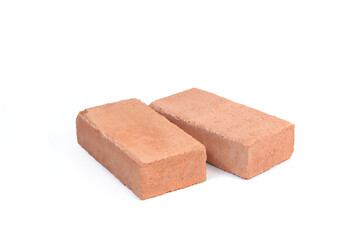 Red bricks isolated on white background. Solid clay bricks used for construction.