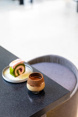 Glass of a iced coffee with cream milk. Copy space.