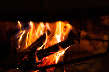 Firewood Burning in a Cozy Fireplace