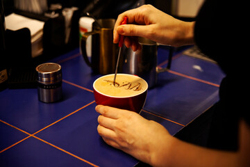 bartender pouring coffee