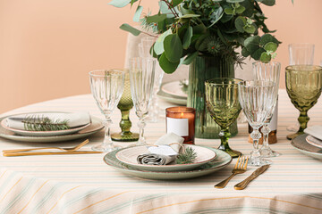 Stylish table setting with wedding invitation