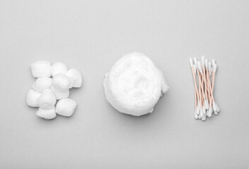 Soft cotton wool, balls and swabs on white background