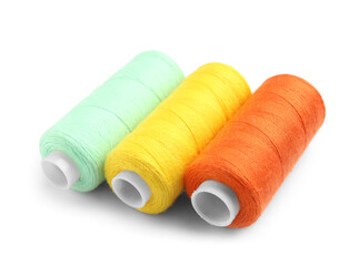 Beautiful sewing threads on white background