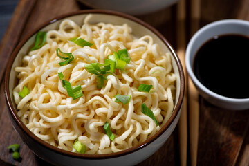 fresh hot egg noodles with vegetables, closeup