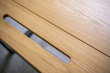 Empty rough wooden table top in the dark room