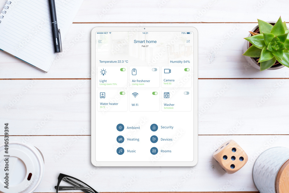 Poster smart home control app on tablet display. home desk, top view, flat lay. modern concept of home auto
