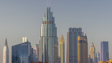 Row of the tall buildings around Sheikh Zayed Road and DIFC district aerial timelapse in Dubai