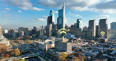 Internet of things. Urban city wifi network connectivity. Data security, cybersecurity, internet hack breach. Philadelphia skyline.