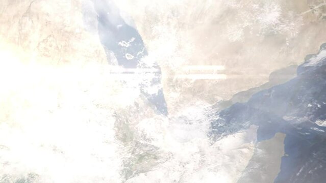 Earth zoom in from outer space to city. Zooming on Hodeidah, Yemen. The animation continues by zoom out through clouds and atmosphere into space. Images from NASA