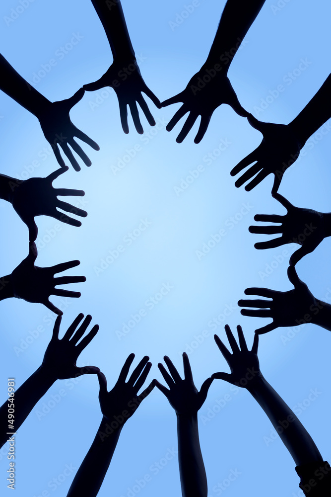 Aufkleber uniting together. cropped shot of a group of hands spread out together in a circle.